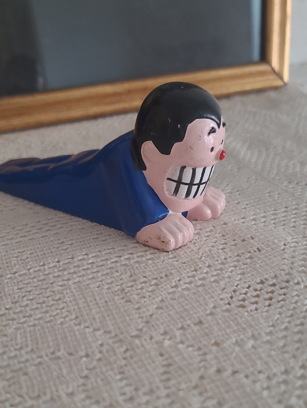 Vintage Grinning Character Doorstop
